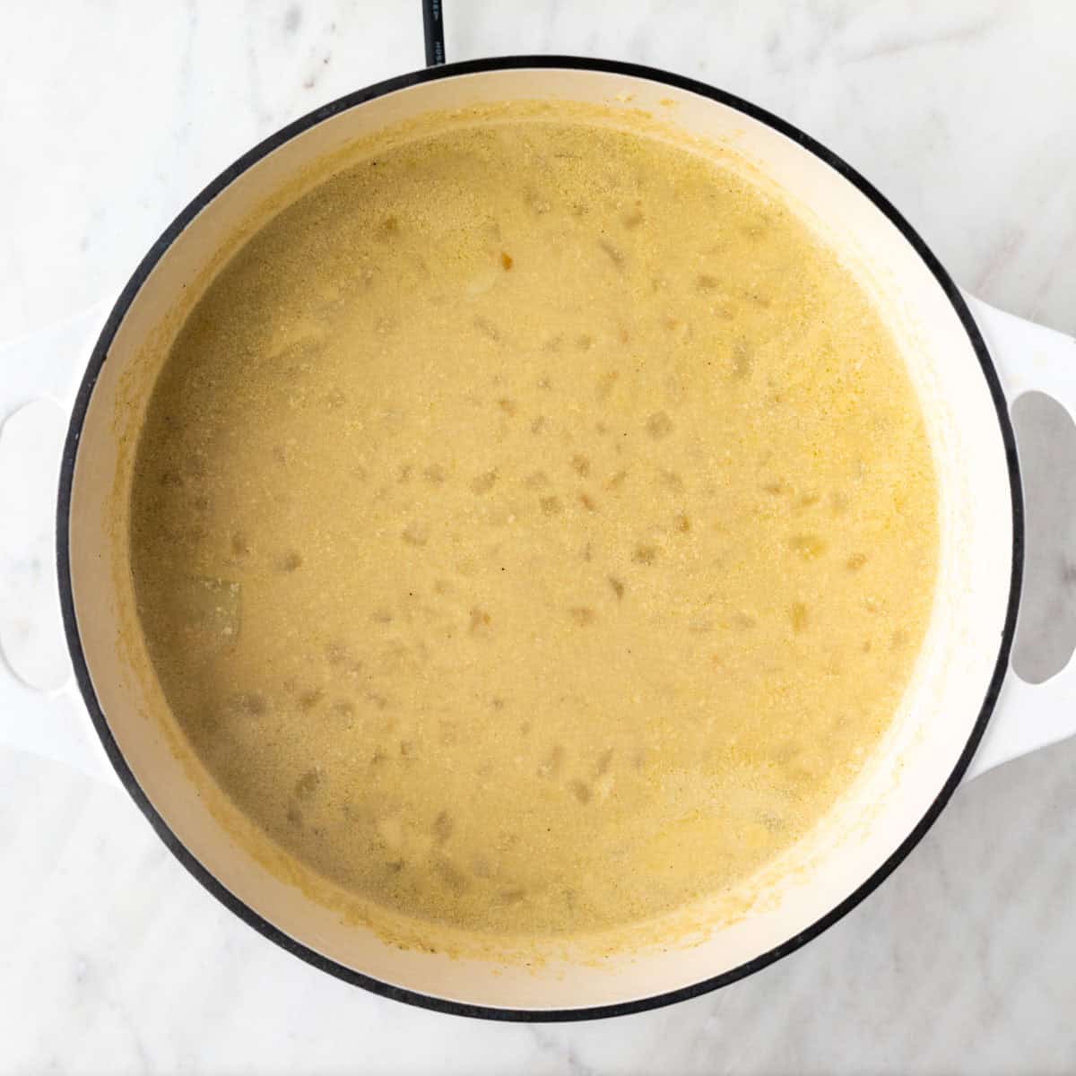 Vegan potato soup cooked in a pot.