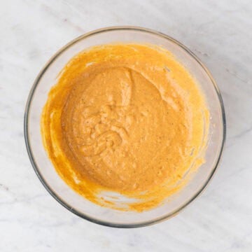 Vegan pumpkin pancakes batter in a large bowl.