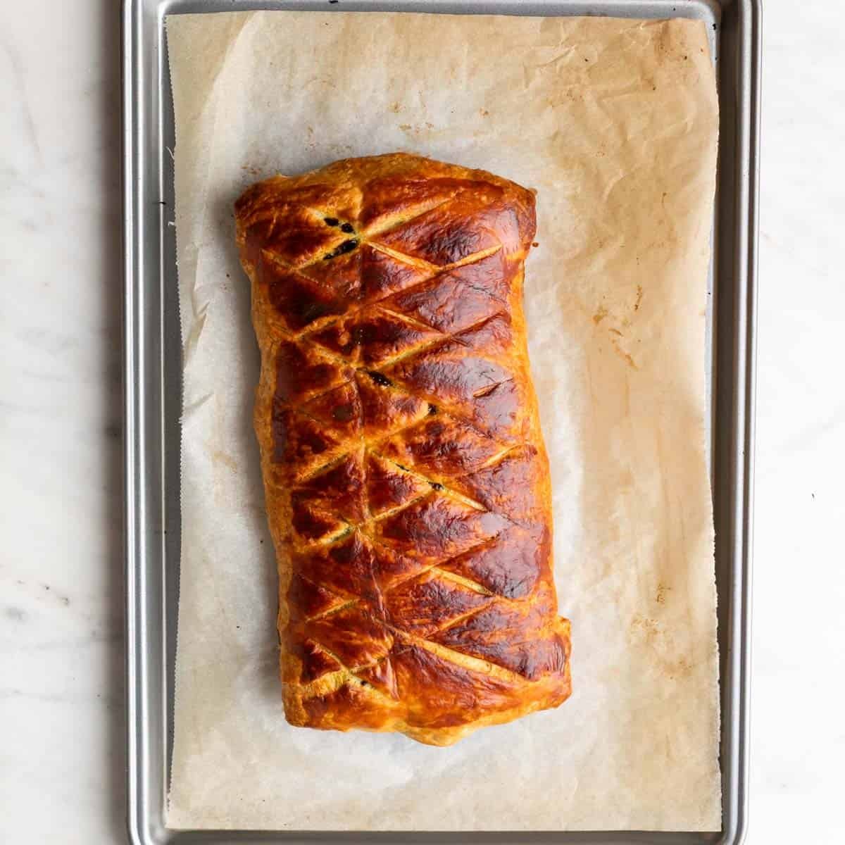 Baked mushroom wellington golden and puffed.