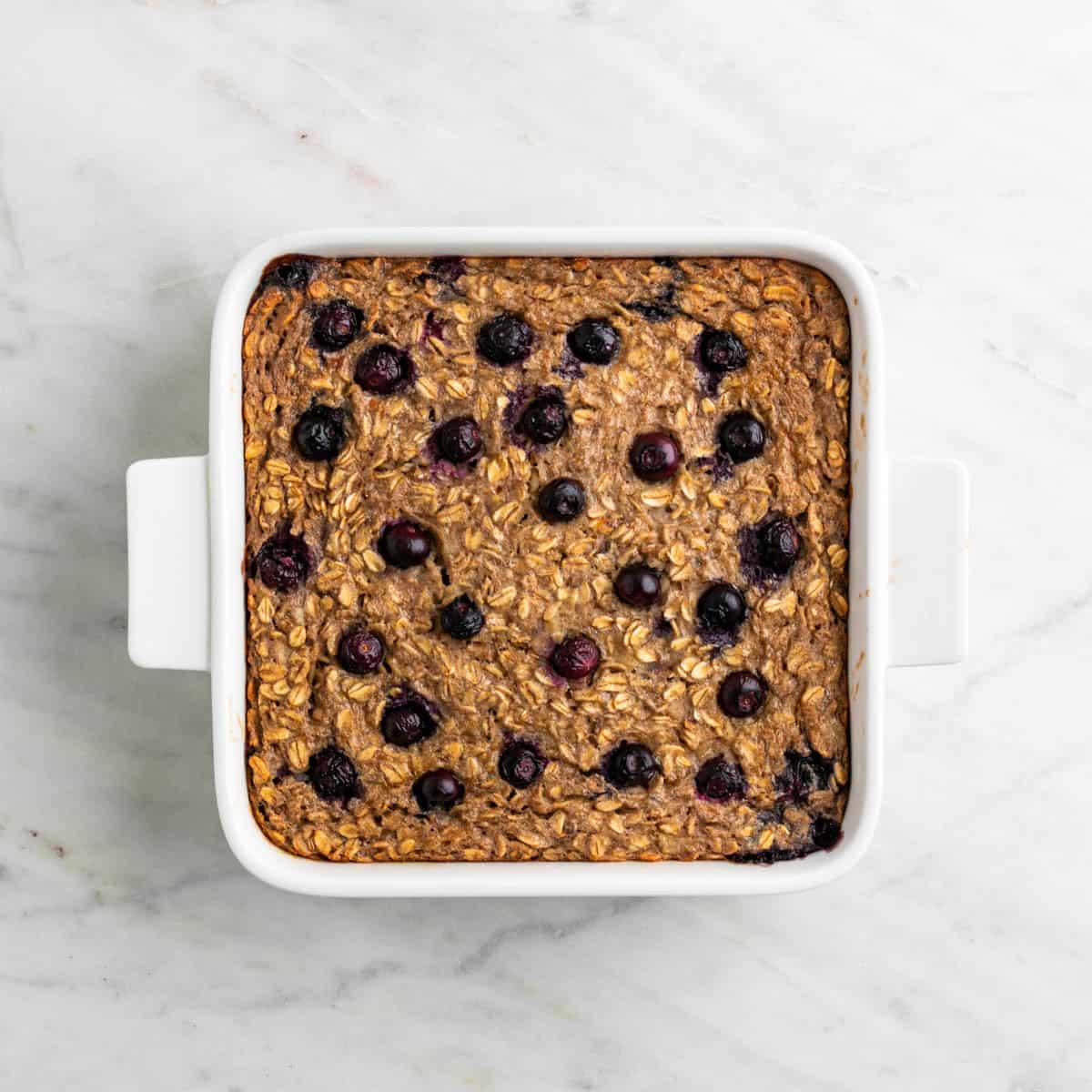 Vegan baked oatmeal baked in a baking dish.