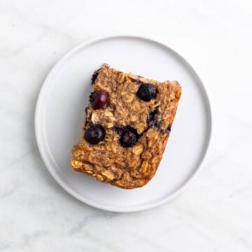 Slice of vegan baked oatmeal served on a plate.