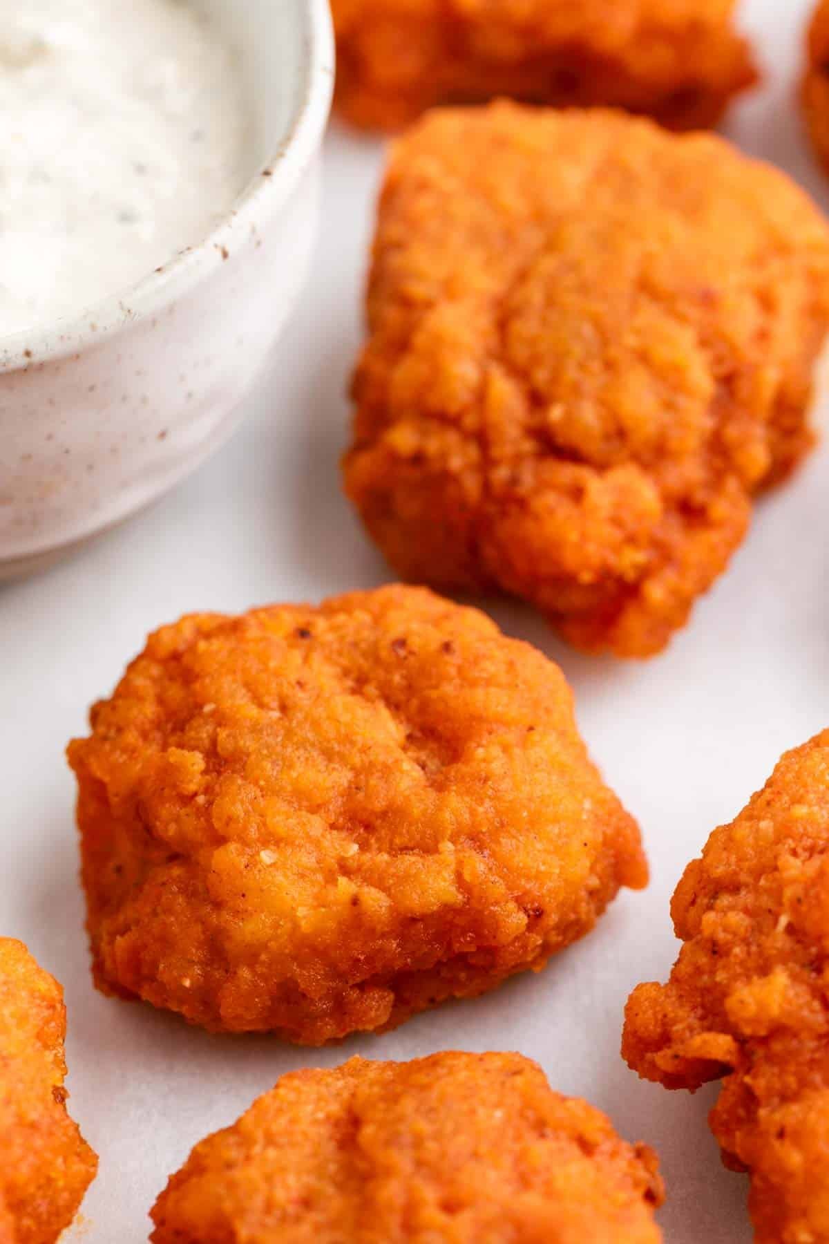 Vegan buffalo wings with vegan blue cheese dressing.