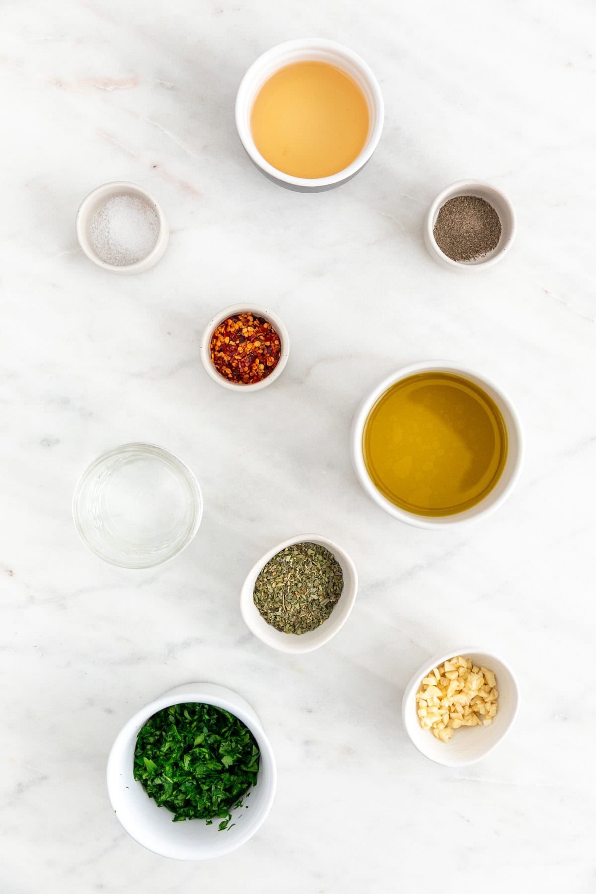 Ingredients to make chimichurri sauce.