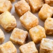 Golden and crispy tofu cubes.