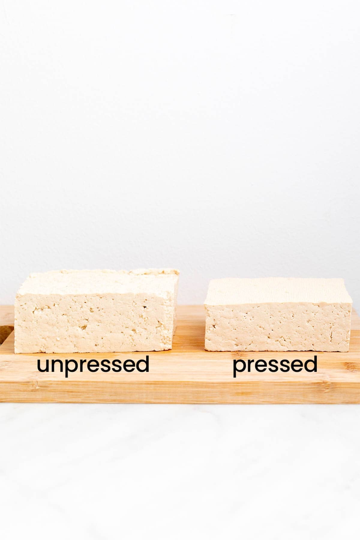 Unpressed and pressed tofu blocks side by side.