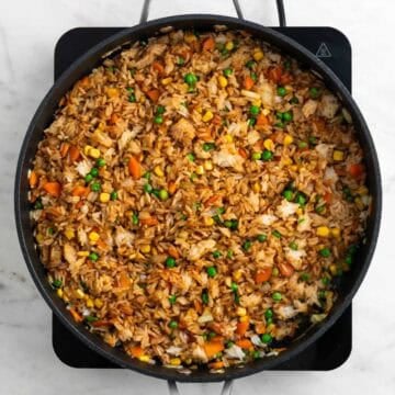 Fried rice mixed with soy sauce and sesame oil.