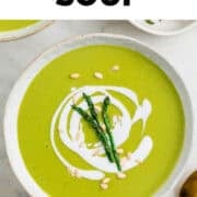 Creamy vegan asparagus soup with coconut milk pine nuts and sautéed asparagus.