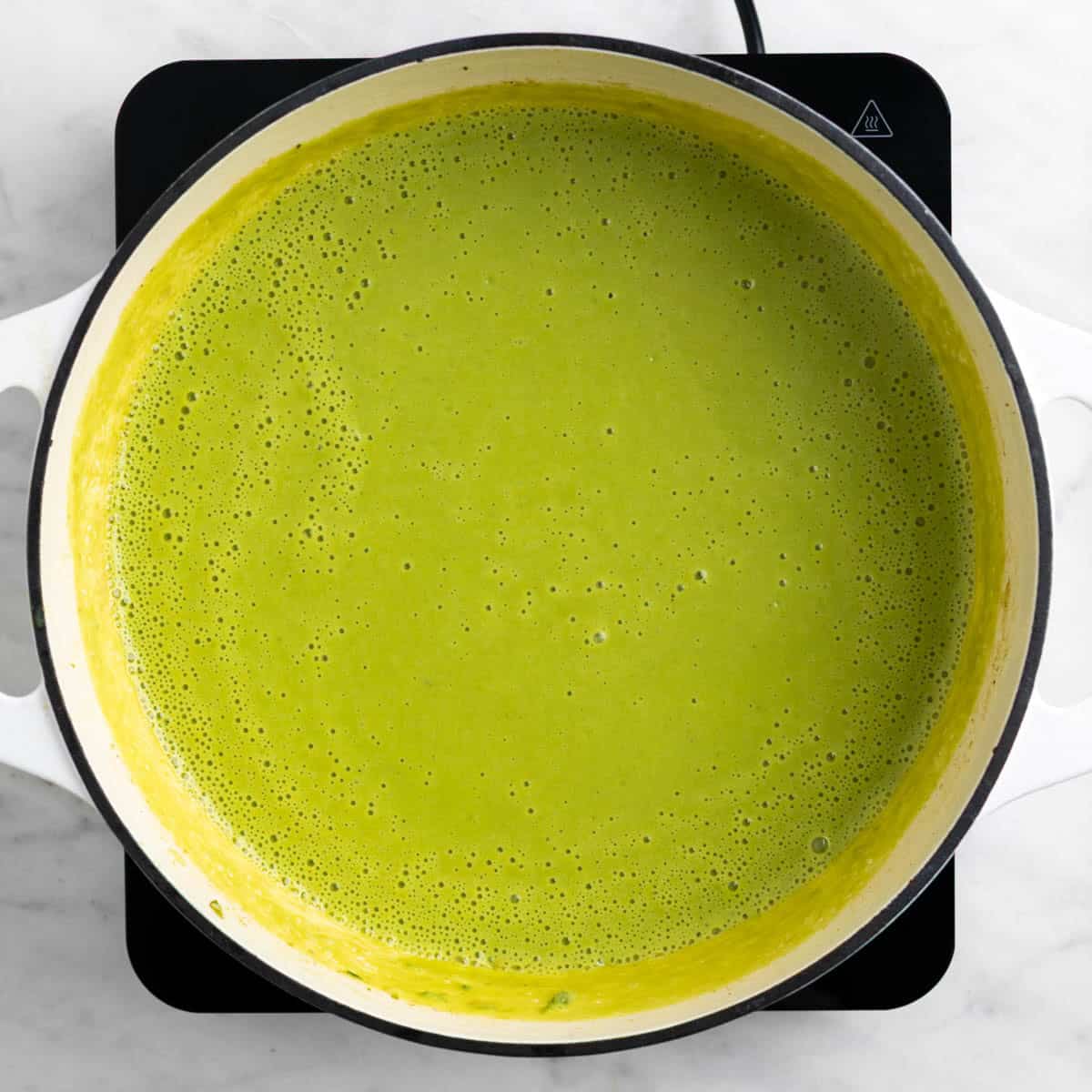 Blended vegan asparagus soup.