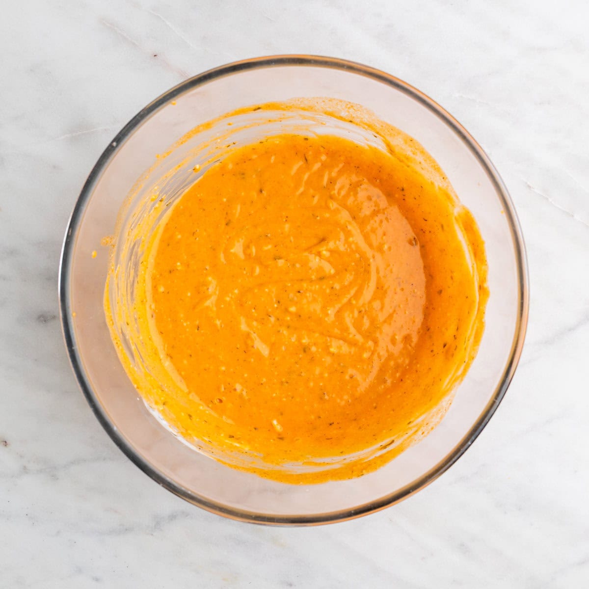 Buffalo sauce and ranch dressing mixed with cream cheese and spices.