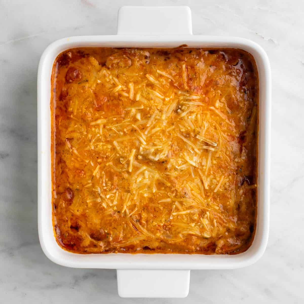 Baked vegan buffalo chicken dip hot and bubbly.
