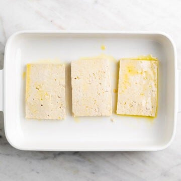 Tofu slabs brushed with olive oil on both sides.