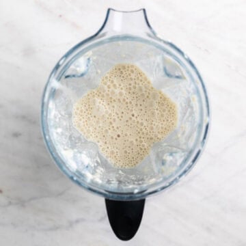 Tofu pasta sauce blended in a blender jar