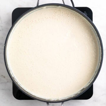 Tofu pasta sauce cooking in a skillet
