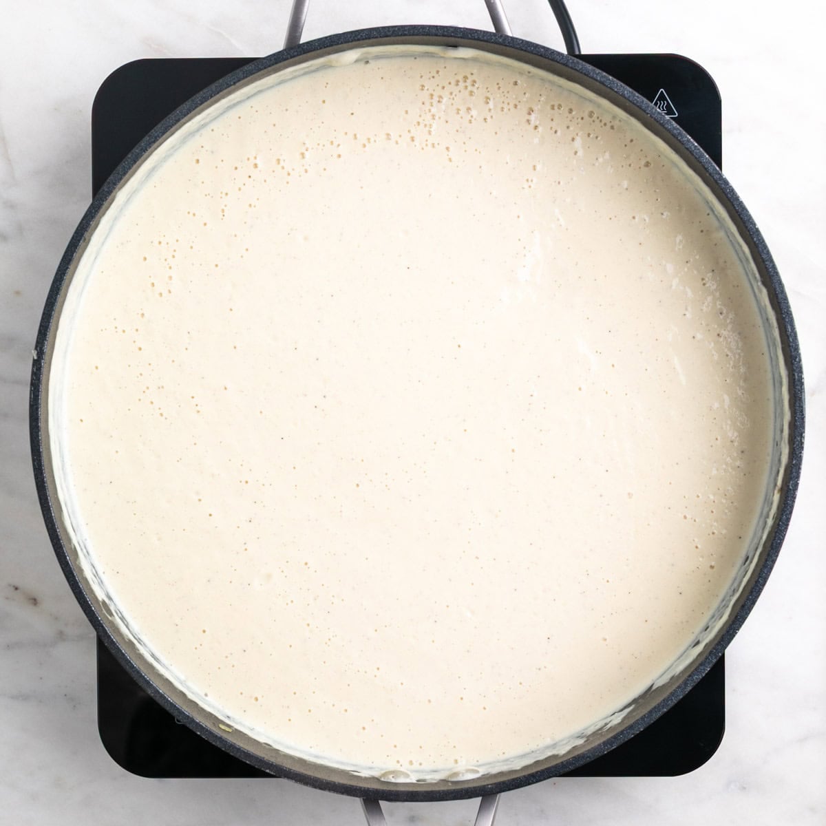 Tofu pasta sauce cooking in a skillet