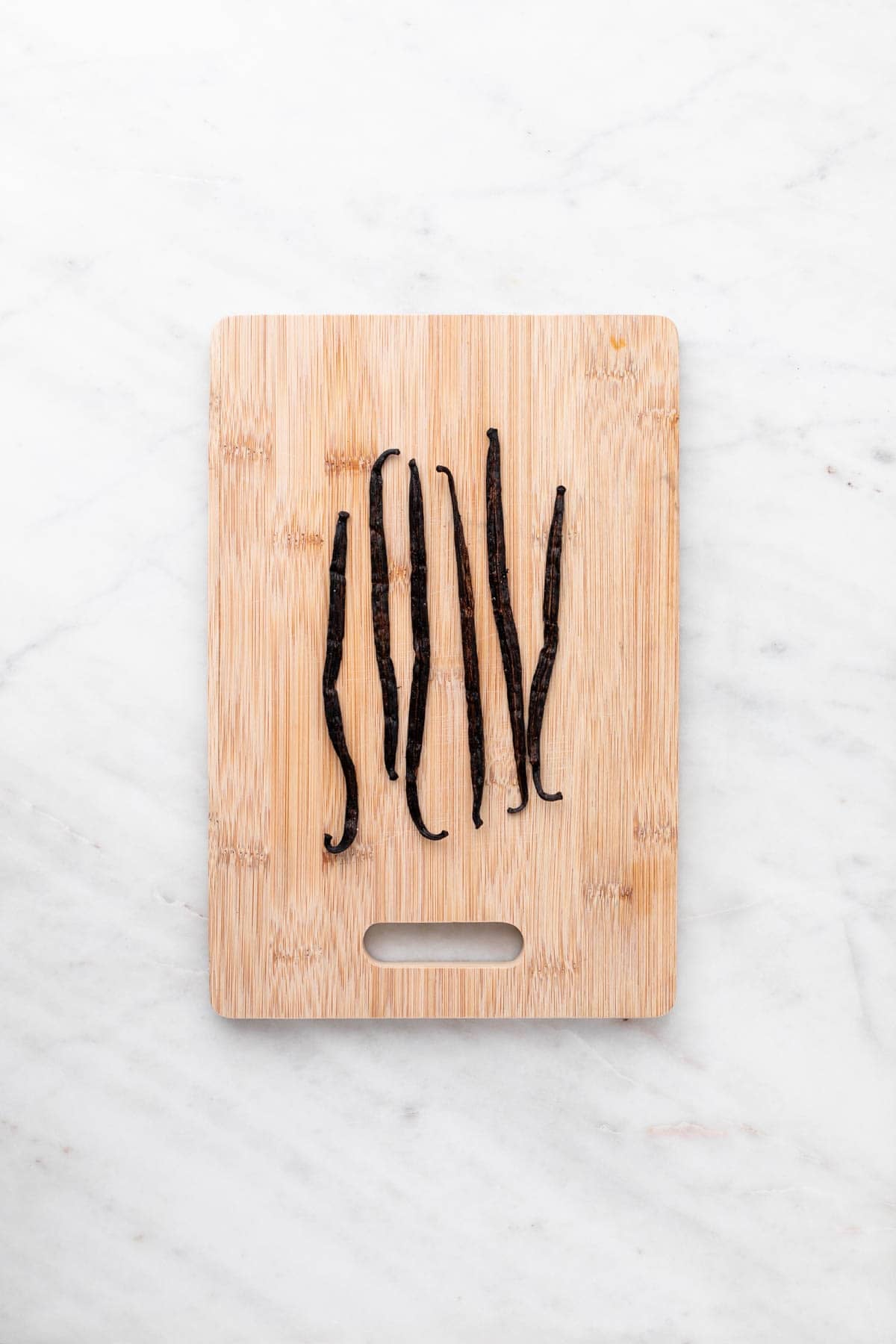 Vanilla beans on a cutting board