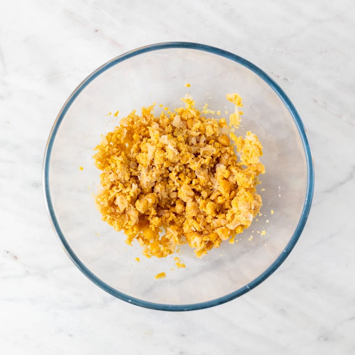 Mashed chickpeas in a bowl