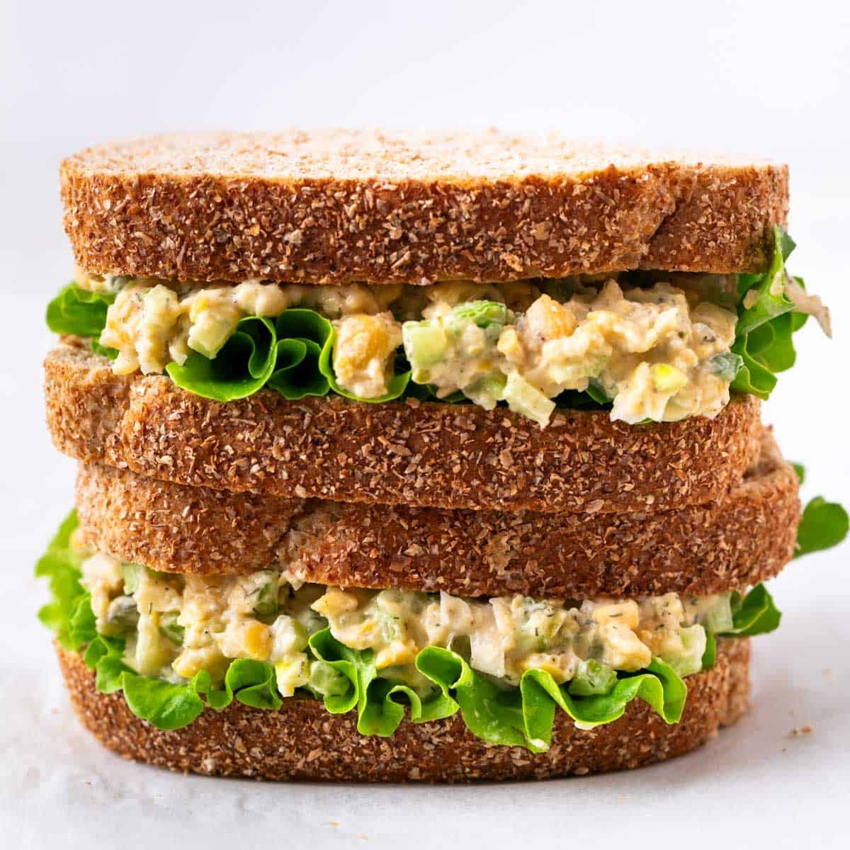 Sandwich filled with the chickpea salad and lettuce