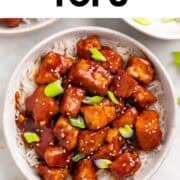 Sticky Korean BBQ tofu bowl with rice and toppings