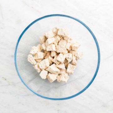 Torn tofu pieces in a bowl