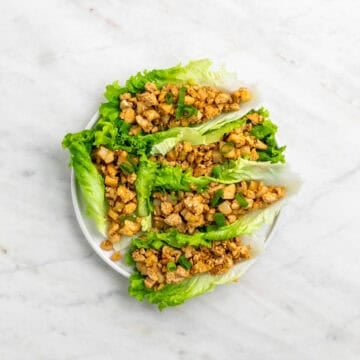 Tofu lettuce wraps served on a plate