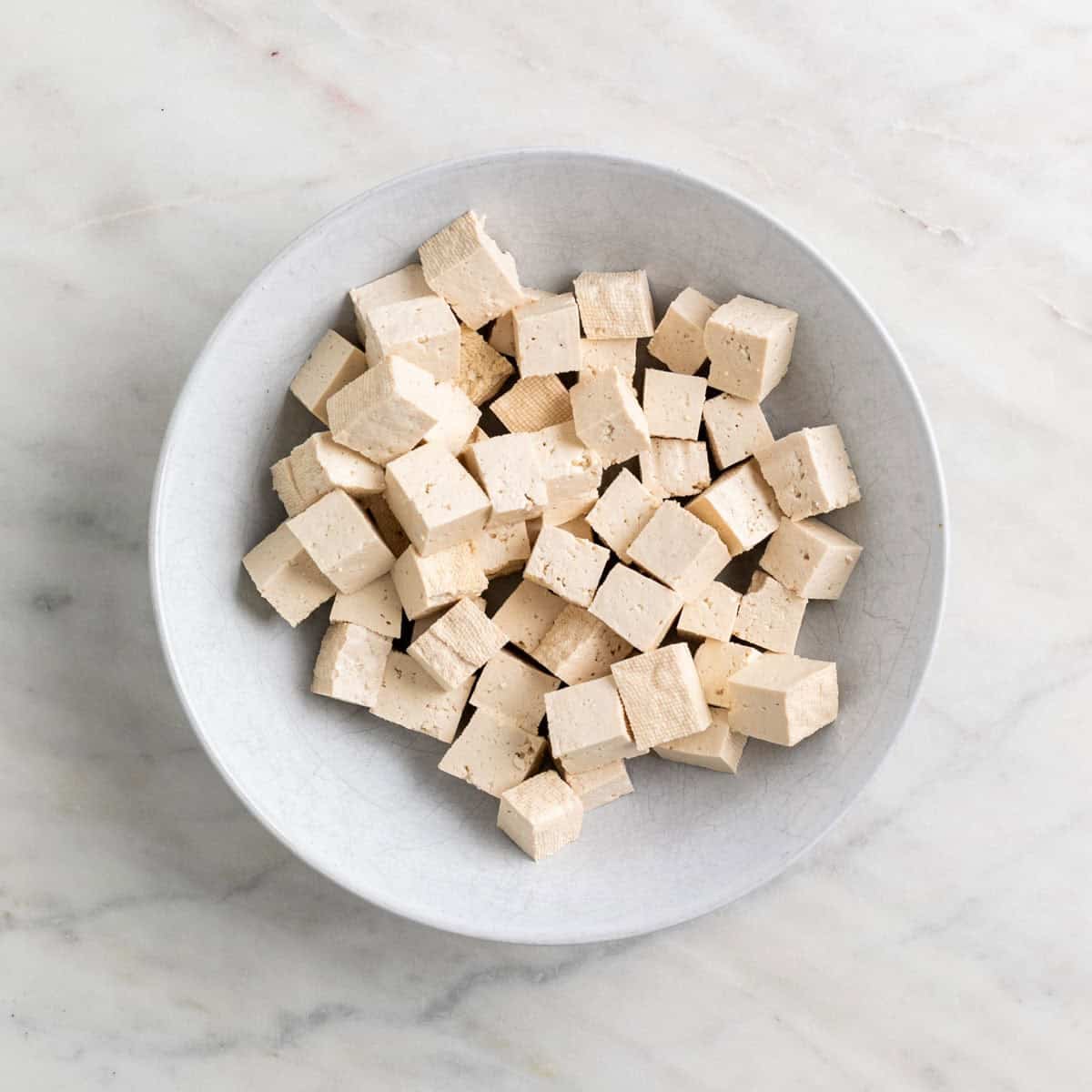 Cubed tofu in a bowl