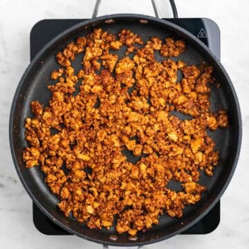 Tofu taco meat fully cooked in a skillet