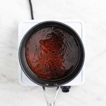 Smoky marinade for vegan bacon bits in a saucepan