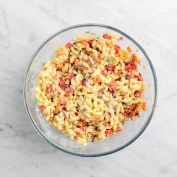 Vegan macaroni salad mixed in a large bowl