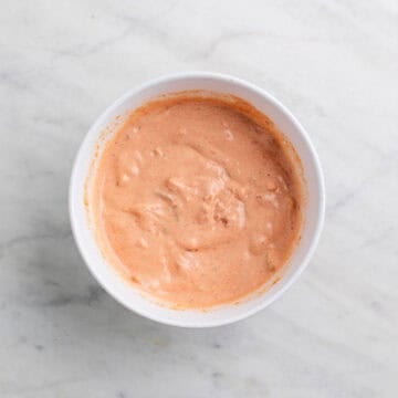Creamy salsa dressing for vegan taco salad in a bowl
