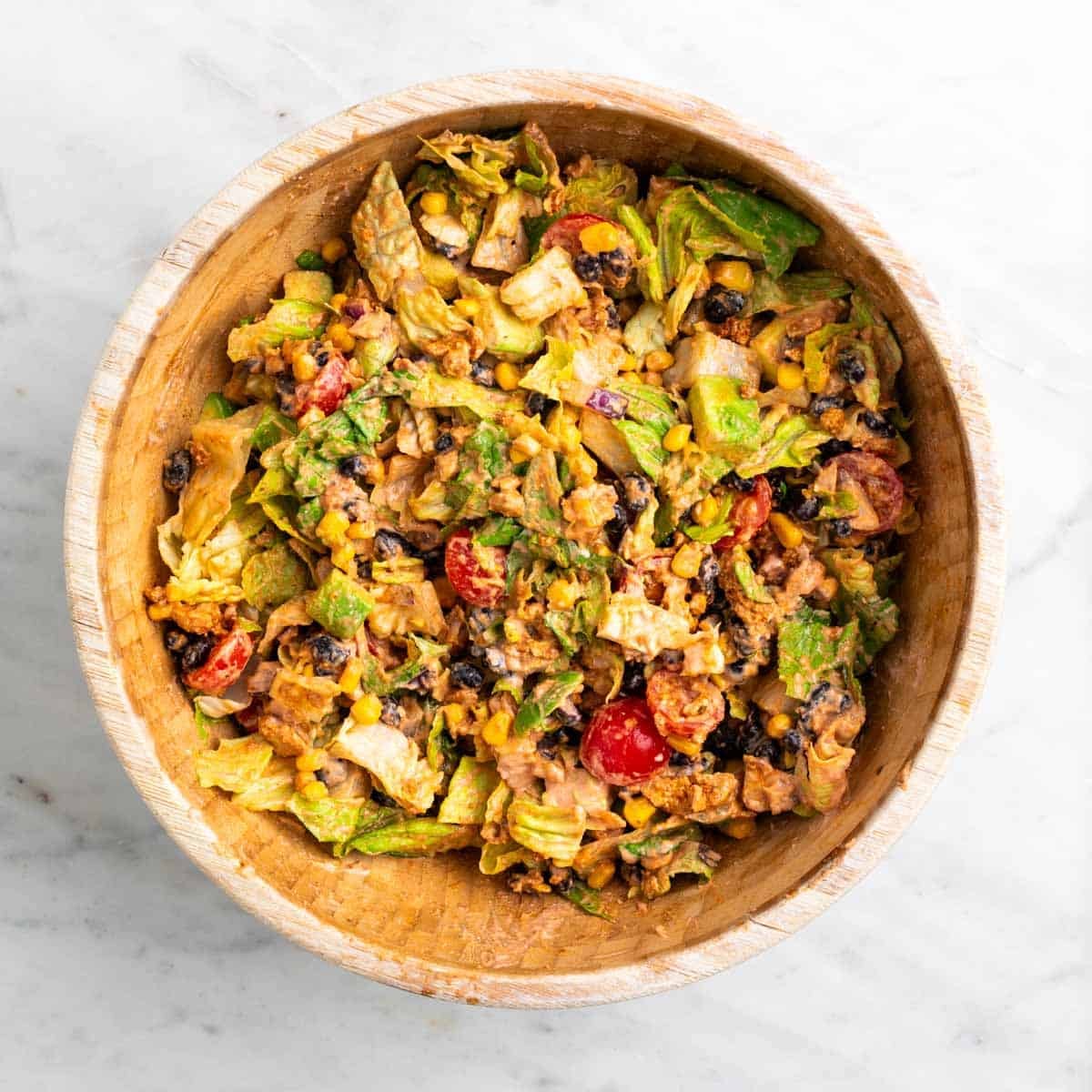 Mixed vegan taco salad in a large bowl