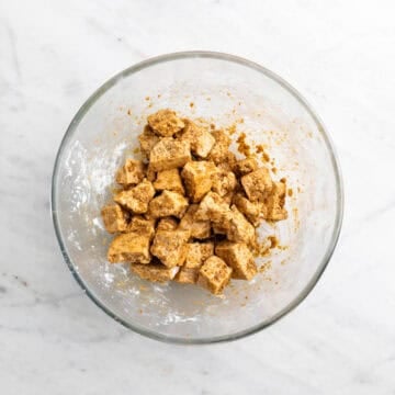 Tofu coated with cornstarch, chicken seasoning, and spices