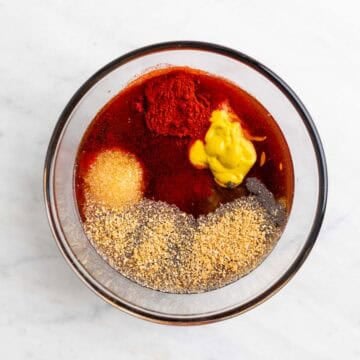 Vegan BBQ sauce ingredients added to a bowl before mixing