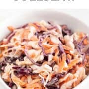 Bowl of vegan coleslaw with shredded cabbage and carrots
