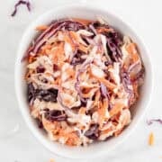 Close-up of creamy vegan coleslaw in a bowl