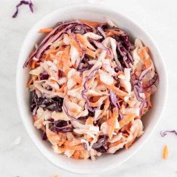 Close-up of creamy vegan coleslaw in a bowl
