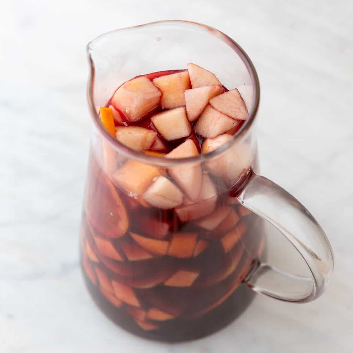Pitcher of Spanish sangria with orange soda added
