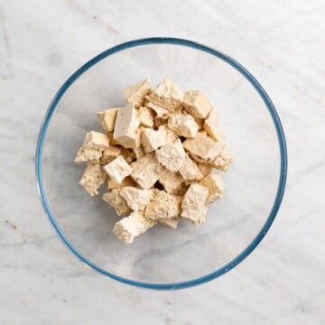 Tofu torn into small bite-sized pieces by hand
