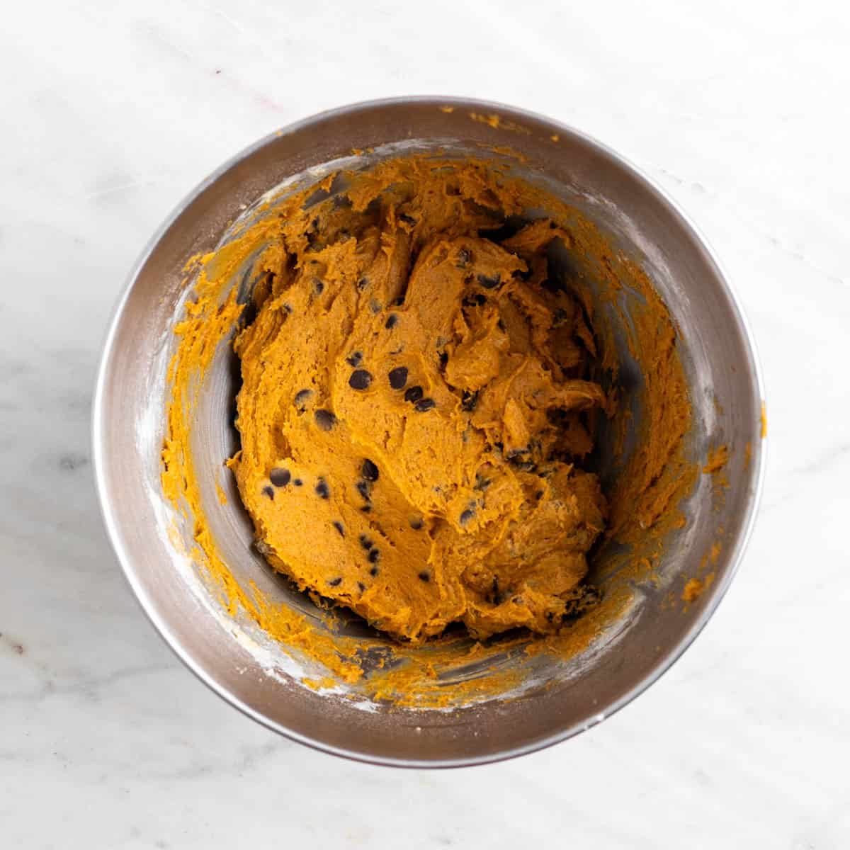 Vegan chocolate chips folded into the dough
