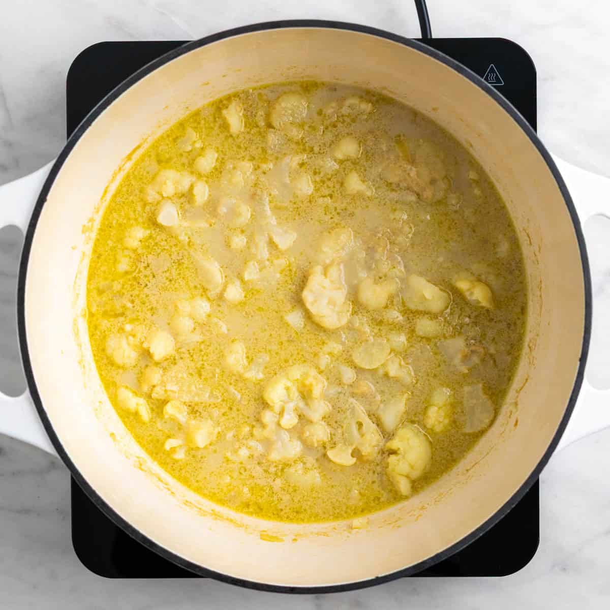Cooked cauliflower soup before blending