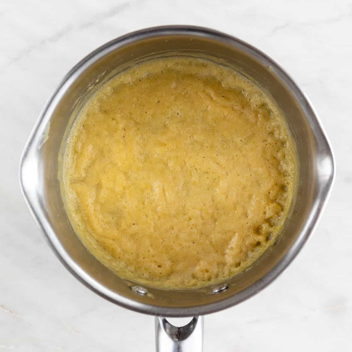 Flour and vegan butter mixture turning lightly golden