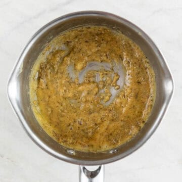 Garlic powder, onion powder, and herbs added to the mixture