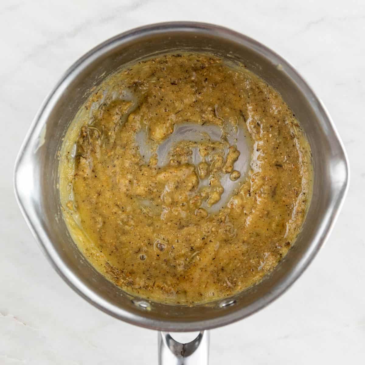 Garlic powder, onion powder, and herbs added to the mixture