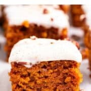 Frosted vegan pumpkin bars cut into squares with pecans and cinnamon