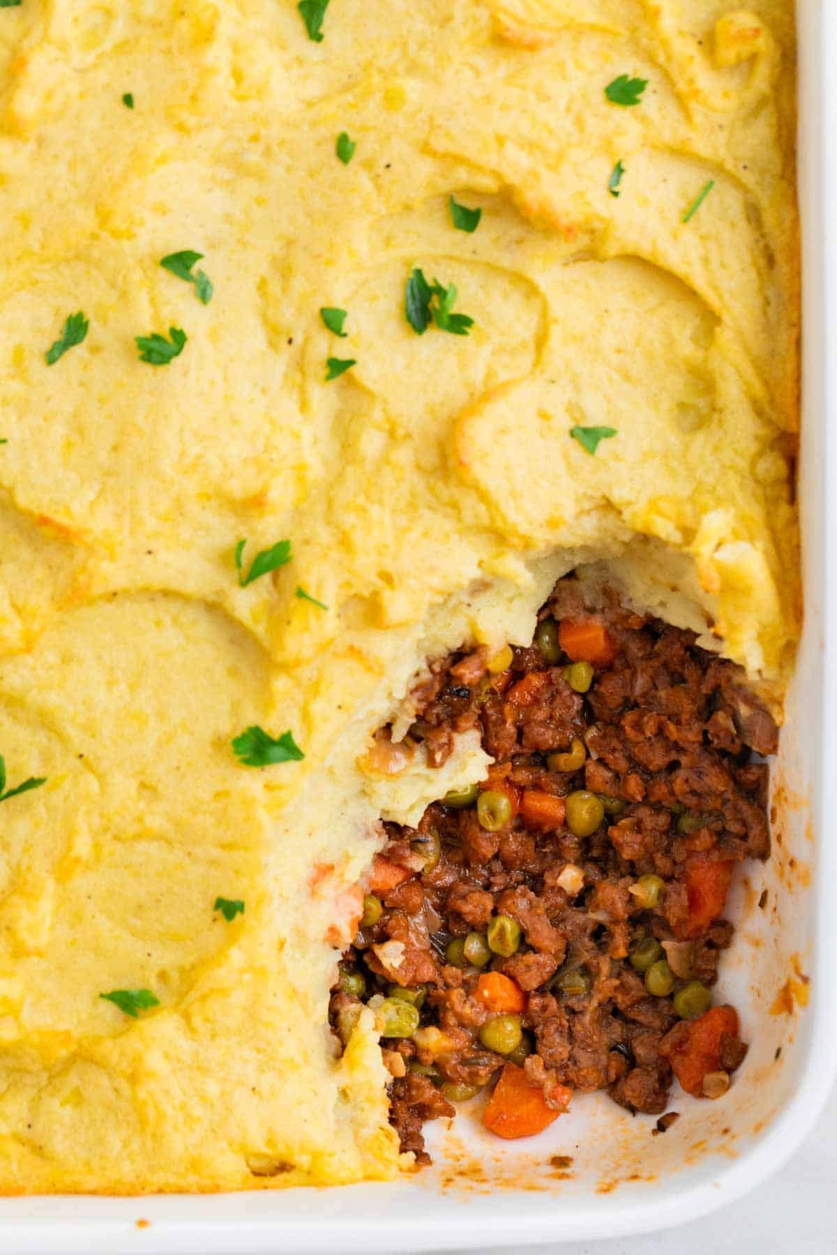 Baked vegan Shepherd's pie with the inside visible