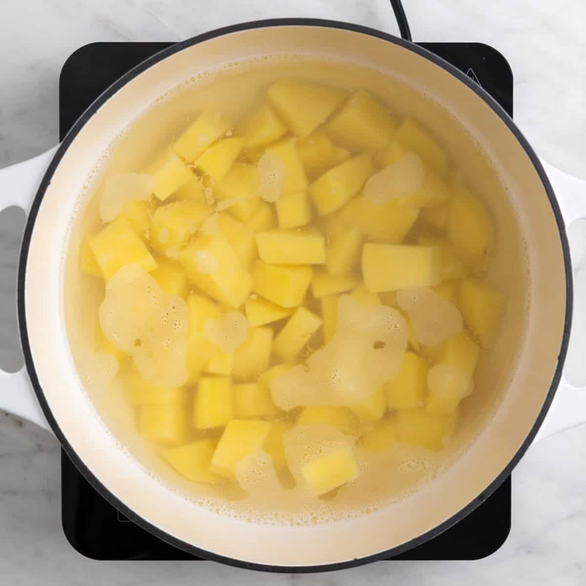 Potatoes cooking in a pot